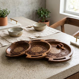 Wooden Carving Plate Bring rustic elegance and artisanal charm to your home with the Wooden Carving Plate Set of 3.